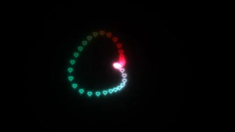 Colorful hearts form a spiral pattern in dark background Stock Footage 338390596