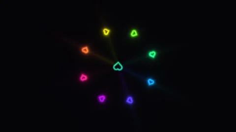 Colorful hearts forming a circular pattern on a dark Stock Footage 338289860
