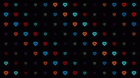 Colorful hearts glowing in a pattern against a dark Stock Footage 338288627