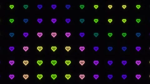 Colorful hearts in a grid pattern bringing light to a dark Stock Footage 338132916