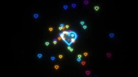 Colorful hearts light up the dark background in vibrant Stock Footage 338207512
