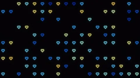 Colorful hearts move in a random pattern on a dark Stock Footage 338133790