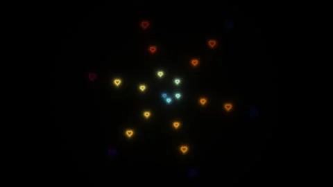 Colorful hearts moving in a circular pattern in dark space Stock Footage 338299277