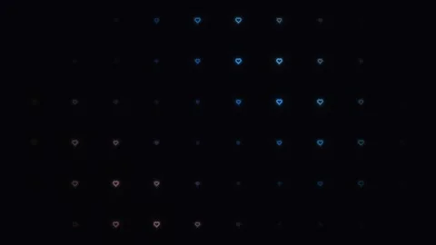 Colorful hearts moving in a grid pattern on a dark Stock Footage 338318749