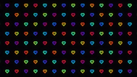 Colorful hearts in a pattern on a dark background Stock Footage 338187425