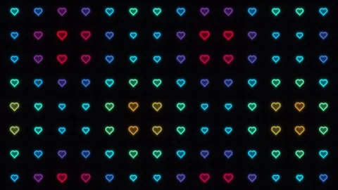 Colorful hearts in a pattern on a dark background Stock Footage 338210201