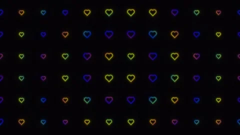 Colorful hearts pattern on dark background creating a Stock Footage 338343064