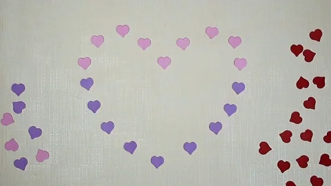 Colorful hearts scatter on the table Stock Footage 102228410