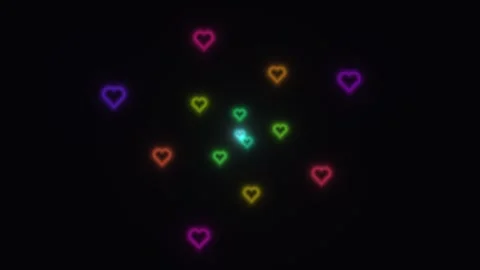 Colorful hearts in a swirling pattern on a dark background Stock Footage 338280205