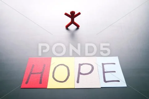 Colorful hope word and single person Stock Photos