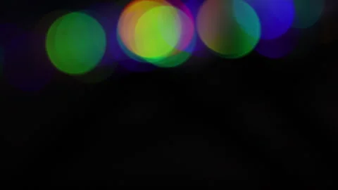 Colorful horizontal row bokeh light movement above Vídeo Stock 309483523