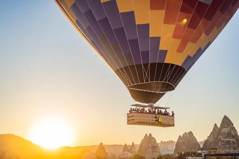 Colorful hot air balloon flying over Cappadocia, Turkey Stock Photos