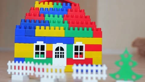 Colorful house of plastic constructor blocks indoor Stock Footage 149583517