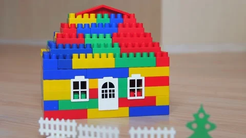Colorful house of plastic constructor blocks indoor Stock Footage 149583635