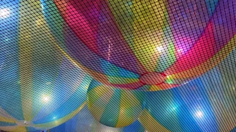 Colorful inflatable balls in a net Stock Footage 314866228