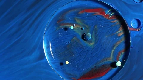 Colorful ink bubbles on the oil surface. 스톡 동영상 80903377