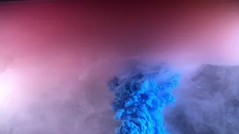 Colorful ink paint drops top view, color blending in the water in slow motion Stock Footage 101072121