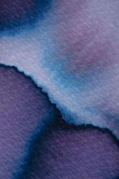 Colorful ink patterns create abstract visuals on textured paper surface Illustrazione stock