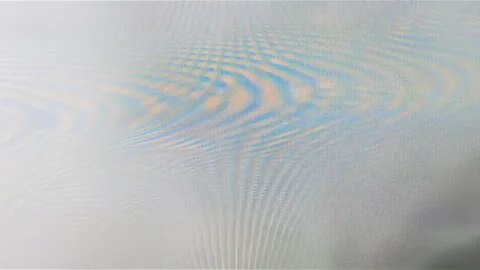 Colorful interference pattern with wavy lines and soft rainbow hues. Stock Footage 329435534