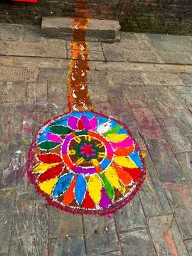Colorful intricate rangoli pattern made from powdered colors celebrating th.. Stock Photos