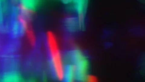 Colorful iridescent light elements flying chaotic in space. Natural created Stock Footage 106289178