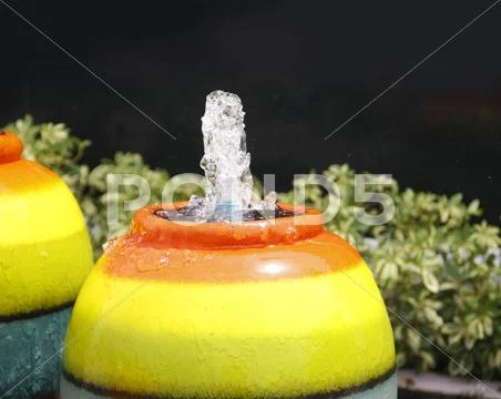 Colorful jar fountain Stock Photos