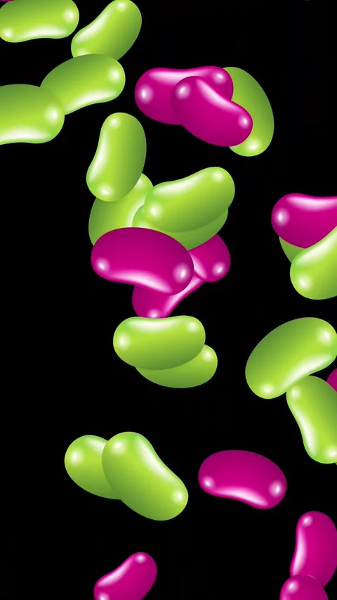 Colorful Jelly Beans Falling and Bursting Against a Black Background Stock Footage 345120927