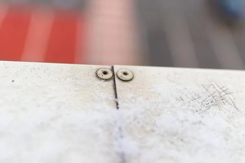 A colorful joint of two structures resembling a smile in striped pattern Stock Photos