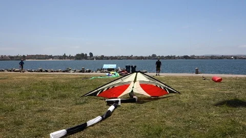 Colorful kite rises up Stock Footage 104769347