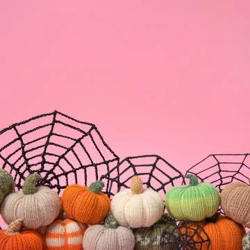 Colorful knitted pumpkins Stock Photos