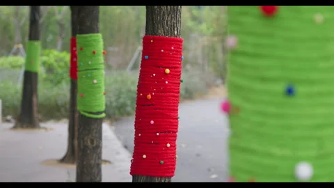 Colorful Knitted Tree Wraps with Focus Shift for Mindfulness Background Use Stock Footage 328296377