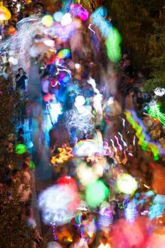 Colorful Lanterns Motion Blur As People Walk In Night Parade Stock Photos