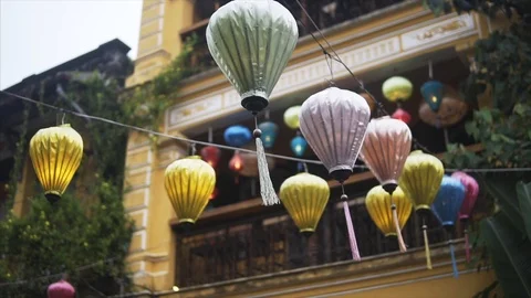 Colorful lanterns spread light on the old street of Hoi An Ancient Town - UNESCO 動画素材 92133686