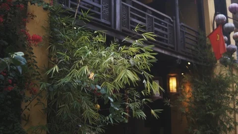 Colorful lanterns spread light on the old street of Hoi An Ancient Town - UNESCO 動画素材 92560368