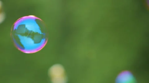Colorful Large Soap Bubbles in Slow Motion. Holiday Background Birthday Clo.. Video stock 303940429