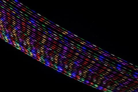 Colorful LED Light Strings on a Black Background Stock Photos