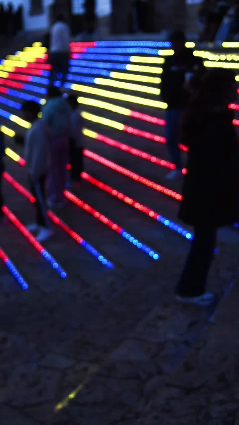 Colorful LED Stair Lights at Night With Blurred People and Bokeh Effects on.. 動画素材 339743553