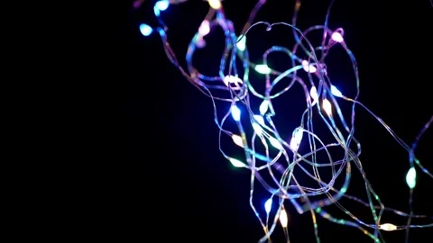 Colorful Led String Lights Glowing and Blinking on Black Background 스톡 동영상 338998955