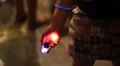 Colorful LED throwies in hands - ready for tossing red and blue HD Footage