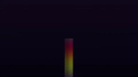 Colorful light beam shines through darkness at night 스톡 동영상 338293857