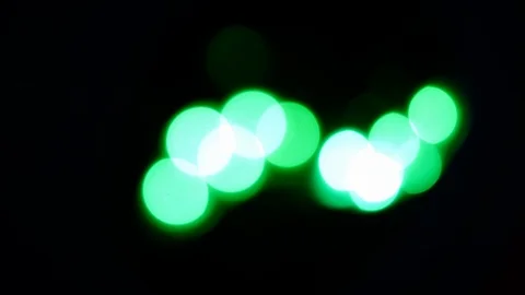 Colorful light blinking on black Stock Footage 90477733