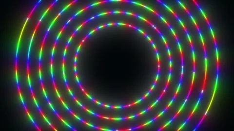 Colorful light circles animate dynamically in a vibrant circular pattern Stock Footage 301301032