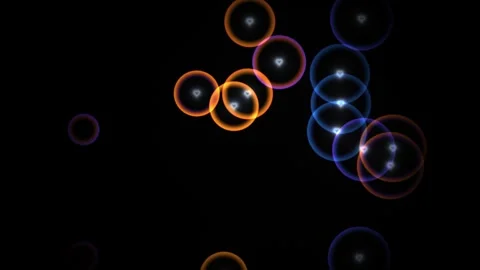 Colorful light circles move in a dark background scene Stock Footage 338229892