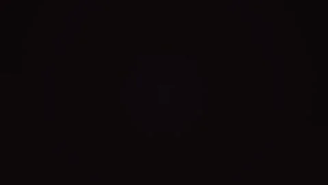 Colorful light display in the night sky over a dark Stock Footage 338289937