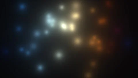 Colorful light particles moving on a dark background Stock Footage 338037989