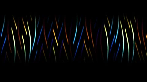 Colorful light patterns create abstract shapes on a dark Stock Footage 338010652