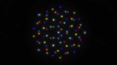 Colorful light patterns create a festive design on a dark 動画素材 338189110