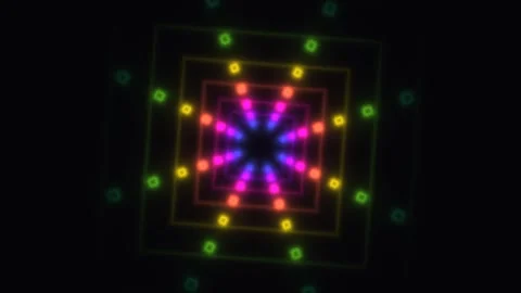 Colorful light patterns create motion in a dark space 스톡 동영상 338237159
