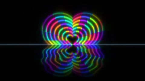 Colorful light patterns create a vibrant display in dark Stock Footage 338015770