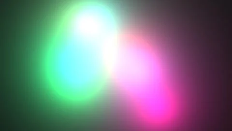 Colorful light patterns create visual effects on a dark Stock Footage 338016192